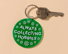Load image into Gallery viewer, And Here We Are Soft PVC Keychains
